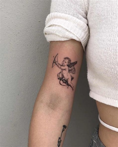 Cupid Tattoo Meaning: Love, Desire, and a Touch of。